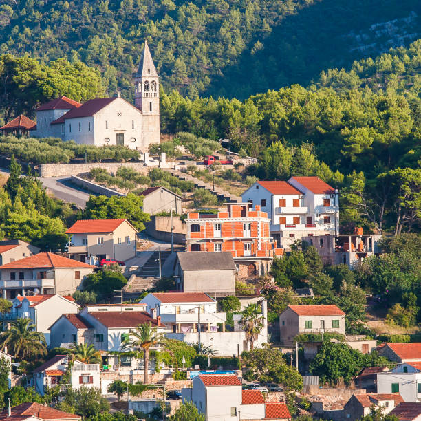 Nice Jelsa in Hvar in Croatia JELSA, CROATIA – CIRCA AUGUST 2016: beautiful view of the town of Jelsa on the island of Hvar in Croatia circa August 2016 in Jelsa.Beautiful view of the town of Jelsa on the island of Hvar in Croatia. jelsa stock pictures, royalty-free photos & images