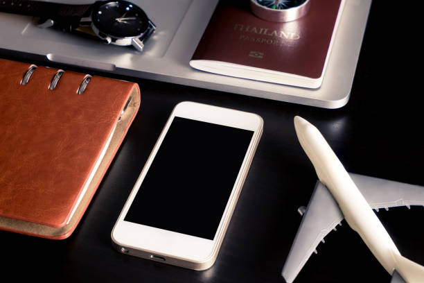 istock Empty phone screen with business travel object mock up 848673810