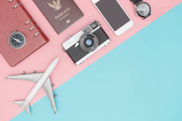 istock travel gadget and accessories on blue and pink copy space 848678398
