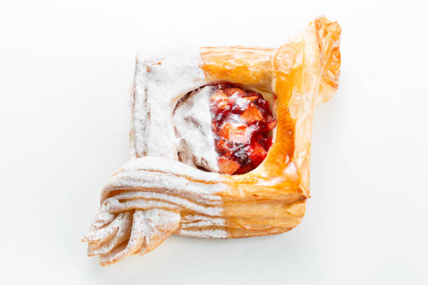 Open pies of Puff pastry pies with cranberries, apples and honey. Puff pastry pies with plums, apples, mint and honey. on white background mark goodson screening room stock pictures, royalty-free photos & images