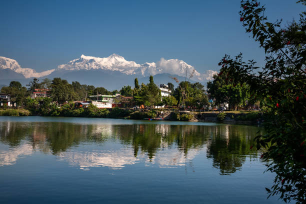 istock View at Annapurna mountain range and its reflection in Phewa lake in Pokhara, Nepal 848682702