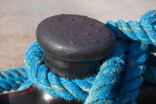 istock Knotted ship jam on a bollard in port 848684624