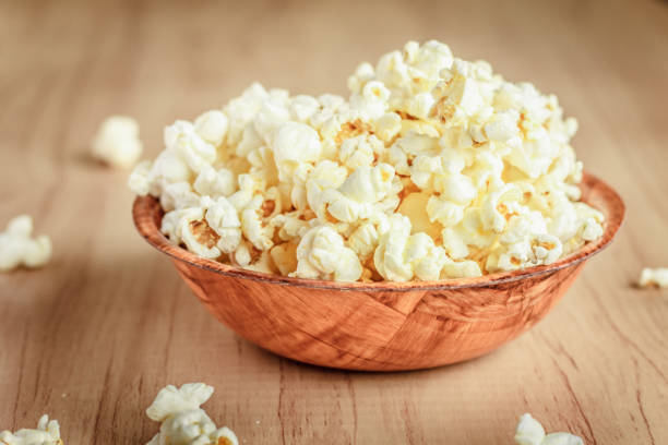 istock Salt popcorn on the wooden table 848712200