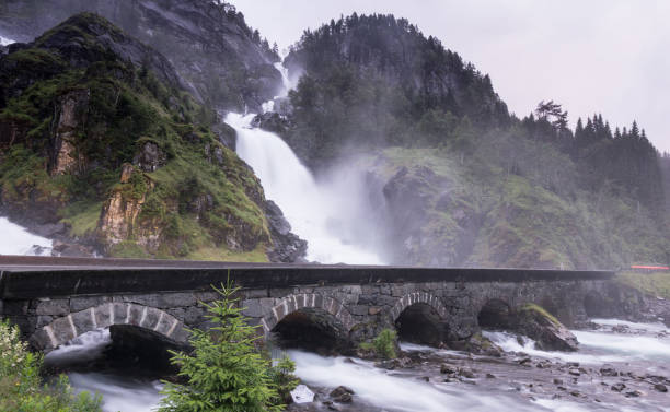 laatefossen waterfall in odda in summer, norway - bridge norway odda falling imagens e fotografias de stock