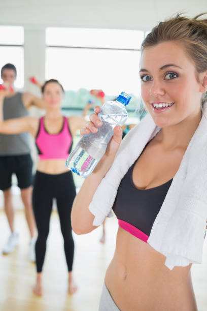 istock Woman with water and towel 848716982