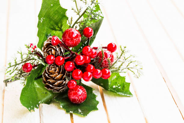 istock Christmas ornaments on white wooden background 848719864