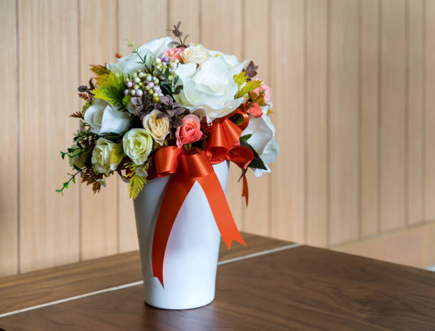 flowers in white vase
