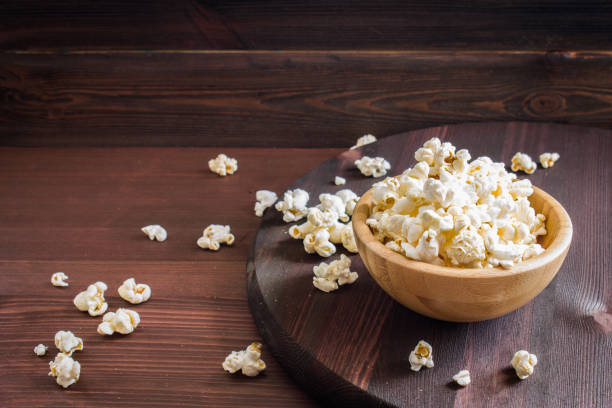 istock Salt popcorn on the wooden table 848726616