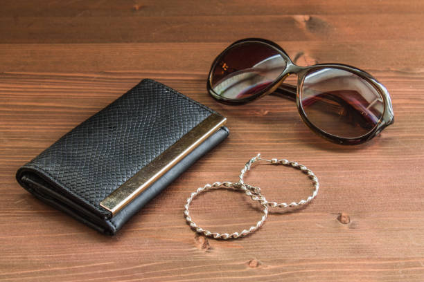 istock black women's purse on a wooden background 848726696