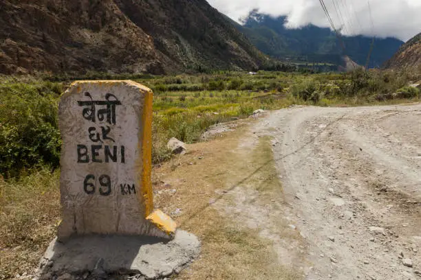 Photo of Milestone near the road in annapurna area, Nepal.