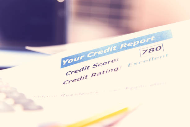 istock Credit report, loan documents, digital tablet, pencil, and calculator on desk. 848743362