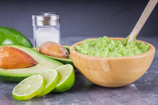 istock avocado Guacamole on molcajete real Mexican traditional procedure 848755768