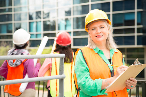 istock STEM Female engineer or architect team working on a construction project in city. 848756298