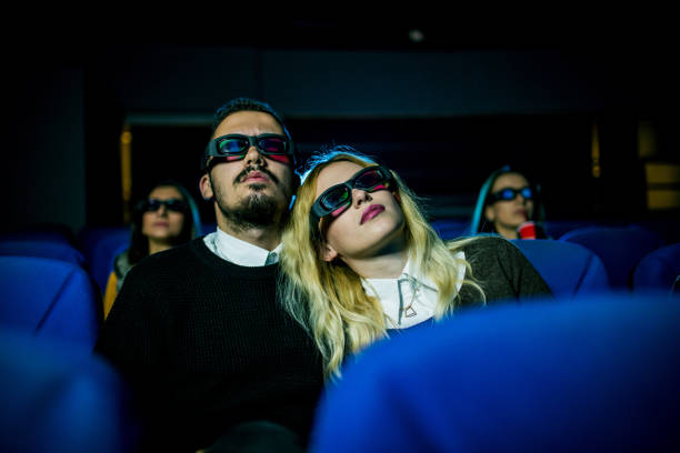 istock Cute couple hugging at the cinema 848759648