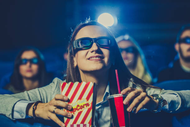 istock Cute girl watching a movie 848760058