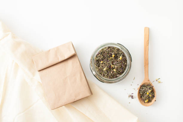 istock Fees medicinal herbs in wooden spoon on white 848769076