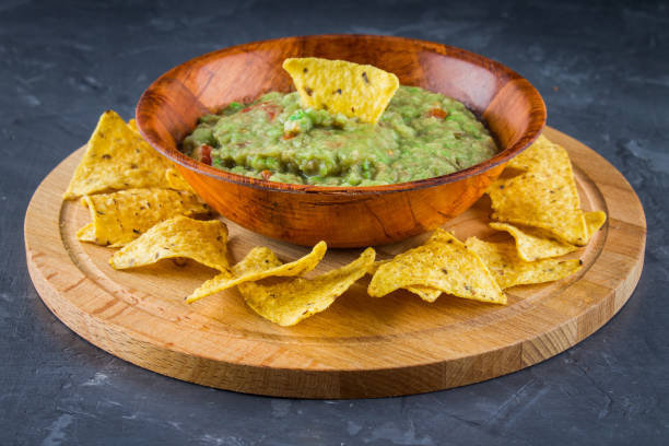 istock nachos with guacamole on a gray background 848773116