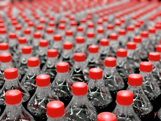 istock Plastic bottles with soda in the store 848773928