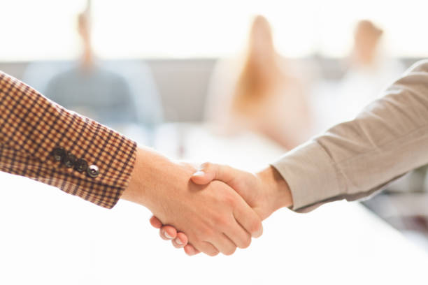 istock Business handshake. Two businessman shaking hands with each other outside 848779102