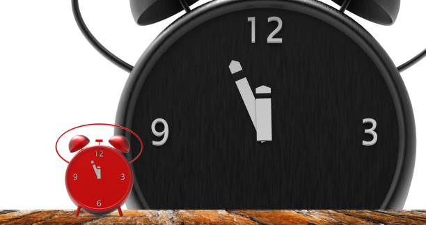 istock alarm clock with little minutes to twelve o'clock 848817890