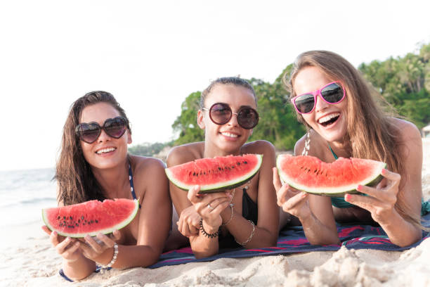 istock Female friends eating watermelon 848821836
