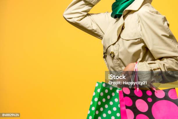 Shopping Woman In Autumn Colors Stock Photo - Download Image Now - Retail, Bag, Clothing