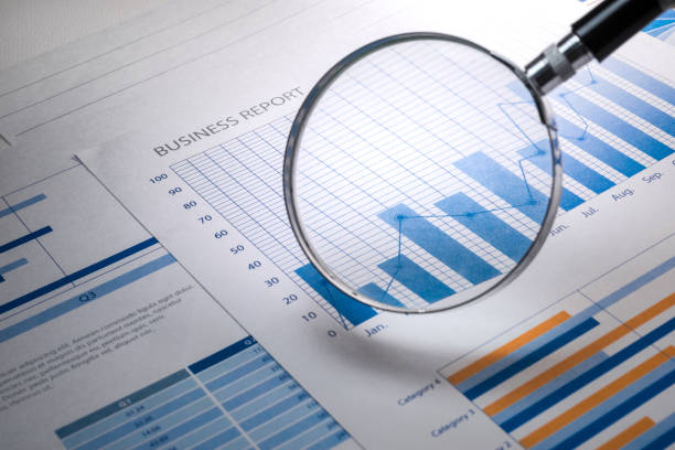 istock Magnifying glass and business growth graph / financial 848833366