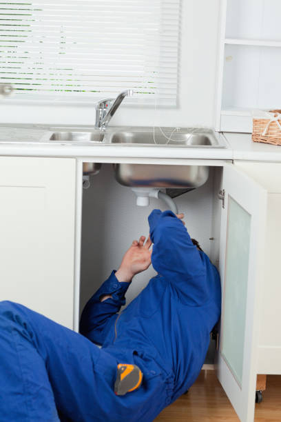 istock Portrait of a plumber fixing a sink 848851158