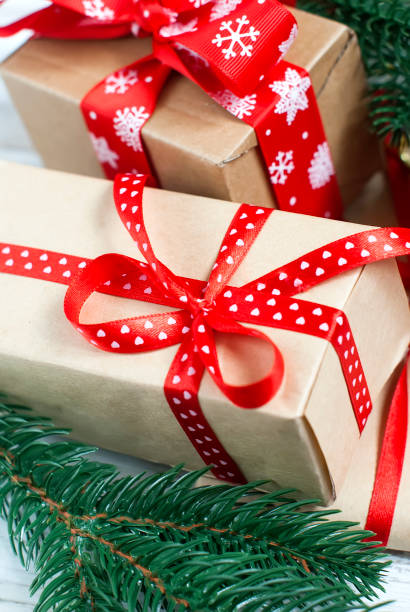istock Christmas boxes, fir branches,  cones, Christmas decorations 848854092