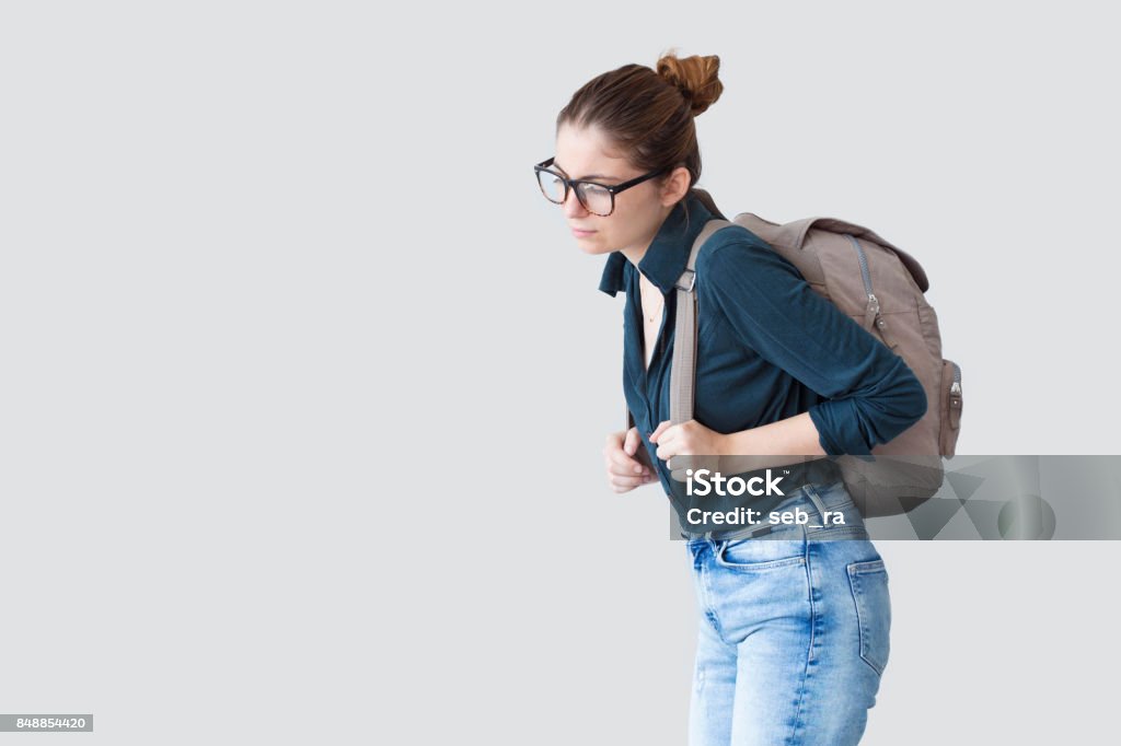 Studentin mit schweren Schultasche - Lizenzfrei Schwer Stock-Foto