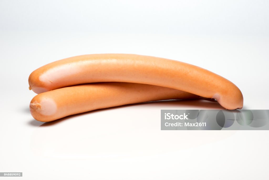 Two sausages set against white background Sausage Stock Photo