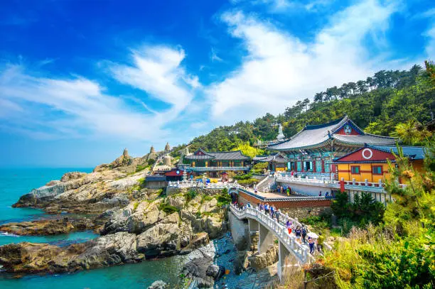 Haedong Yonggungsa Temple and Haeundae Sea in Busan, Buddhist temple in Busan, South Korea.