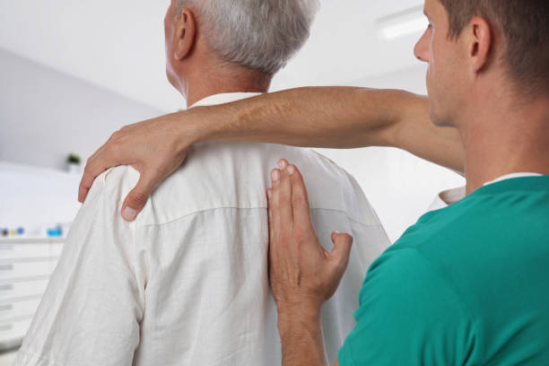 istock Man having chiropractic back adjustment. Osteopathy, Alternative medicine, pain relief concept. Physiotherapy, sport injury rehabilitation 848867794