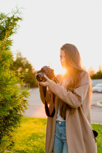 istock Woman photographer watching photos 848874880