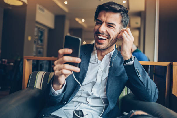istock Happy man with smart phone 848875212