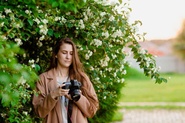 istock Woman photographer watching photos 848877468