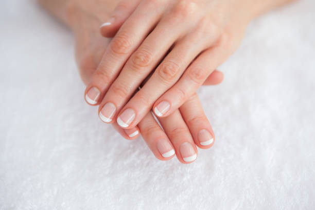 istock French manicured fingers at spa center 848878130