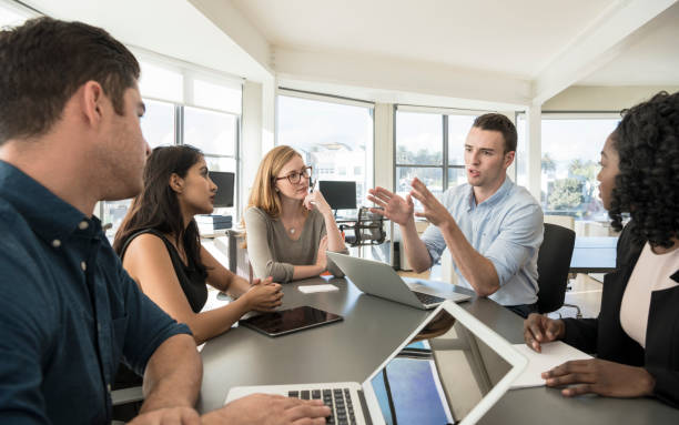 istock Multi racial business colleagues in meeting at work 848878242