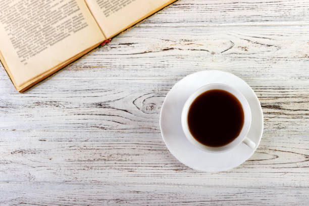 istock Cup of coffee on a wooden table 848888906