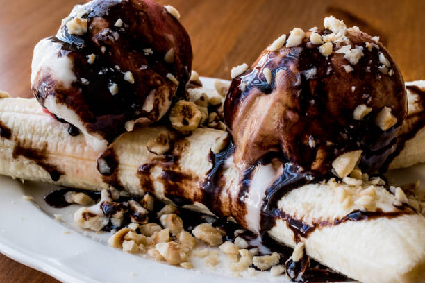 istock Banana Split with ice cream, chocolate sauce and Hazelnuts. 848889272
