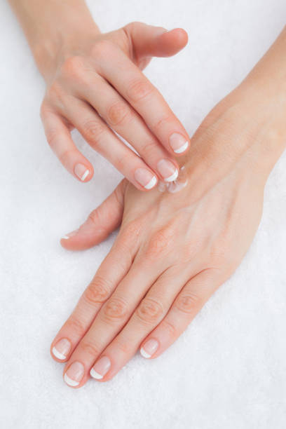 istock Woman applying cream on hand 848899208