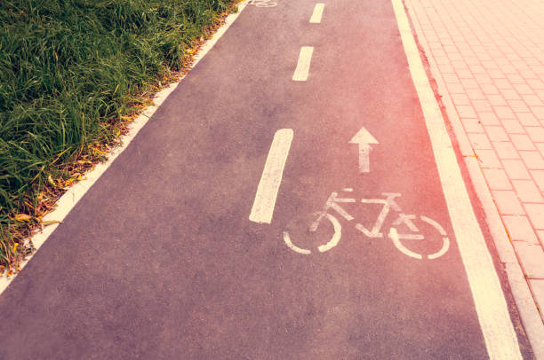 istock A bicycle path in a public park designed to ensure safety on a bicycle. Toning. 848906472