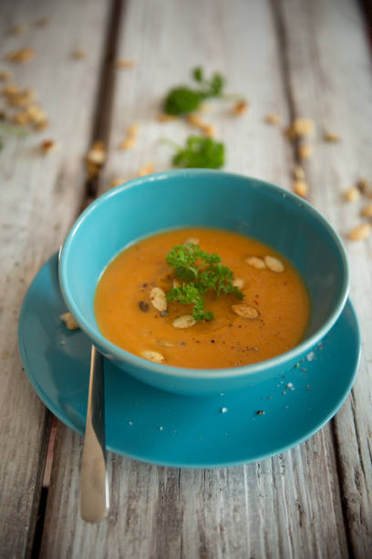 istock Squash soup served with parsley and pumpkin seeds 848906684