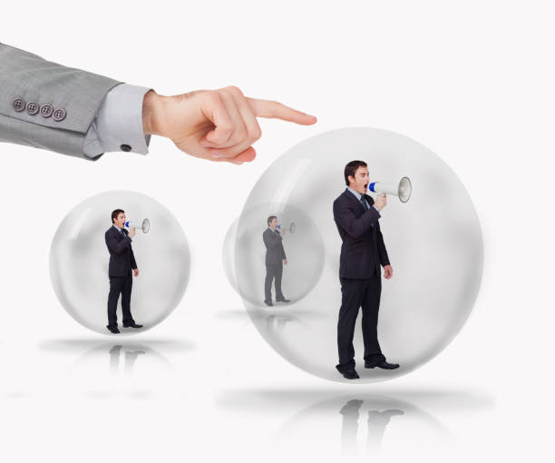 istock Three businessmen standing in bubble with megaphone 848909892