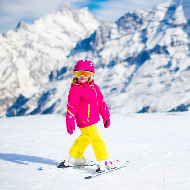 istock Ski and snow fun. Child in winter mountains. 848925688
