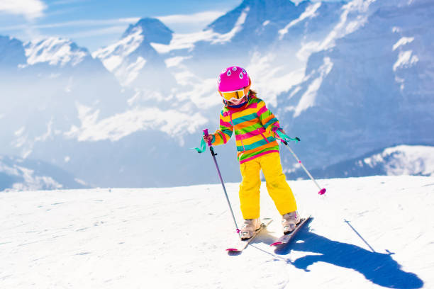 istock Ski and snow fun. Child in winter mountains. 848926246