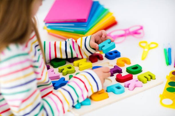istock Child doing homework for school. Kids learn and paint. 848928998