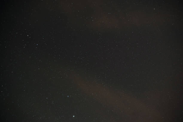 istock Beautiful milky way on a dark night sky with stars 848942208