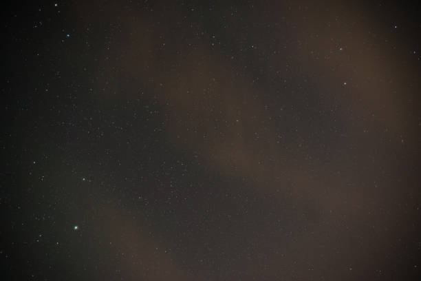 istock Beautiful milky way on a dark night sky with stars 848942268