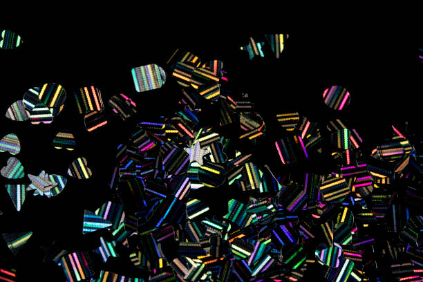 istock Glitter Confetti Holographic Abstract Background on Black 848946590